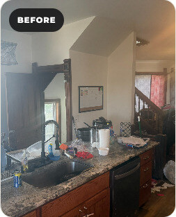 Janesville kitchen and living area before clean-out and renovation.