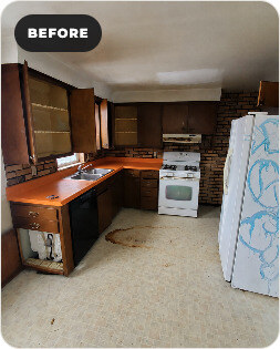 Manitowoc kitchen before renovation with dated cabinets and finishes.
